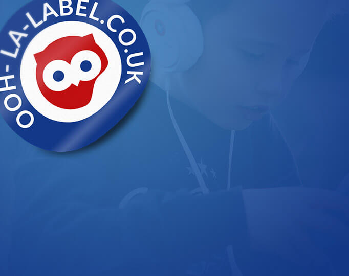 boy in blue, behind ooh la label logo