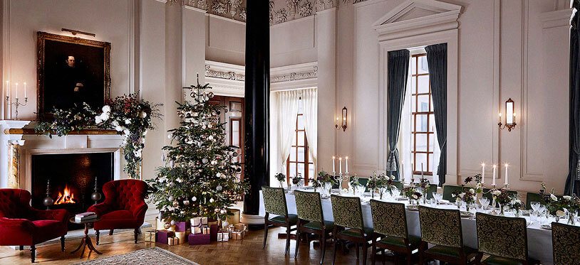 a festively decorated dining hall, soho house