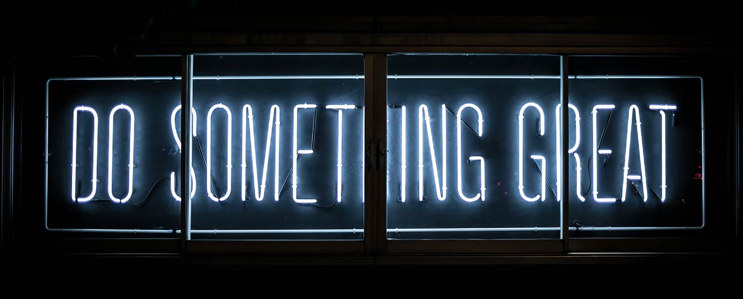 neon sign with text, 'do something great'