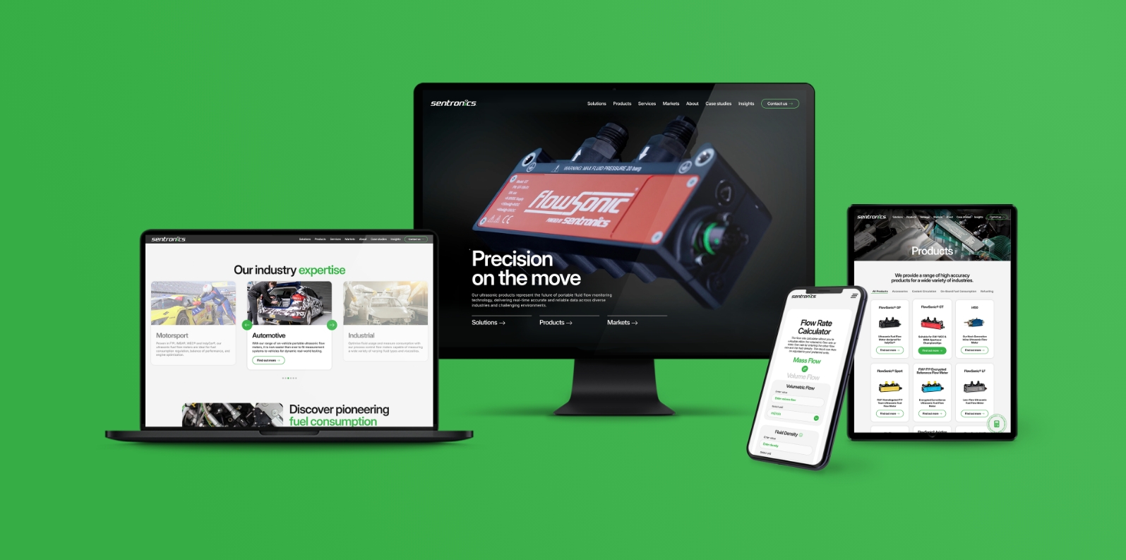 Laptop, desktop monitor, tablet, and smartphone displaying the Sentronics website design by Above Digital.