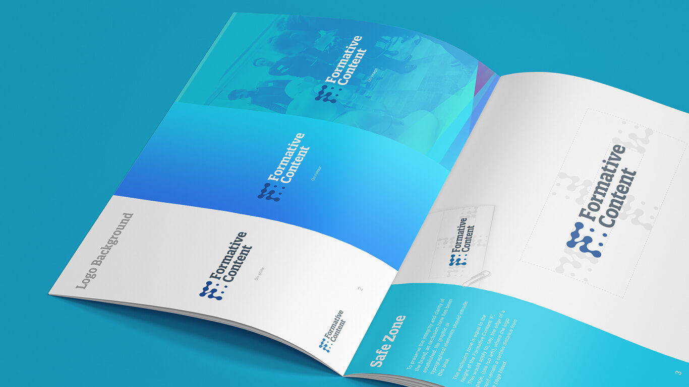 A printed brand guidelines booklet showcasing logo application, color palettes, and typography rules.