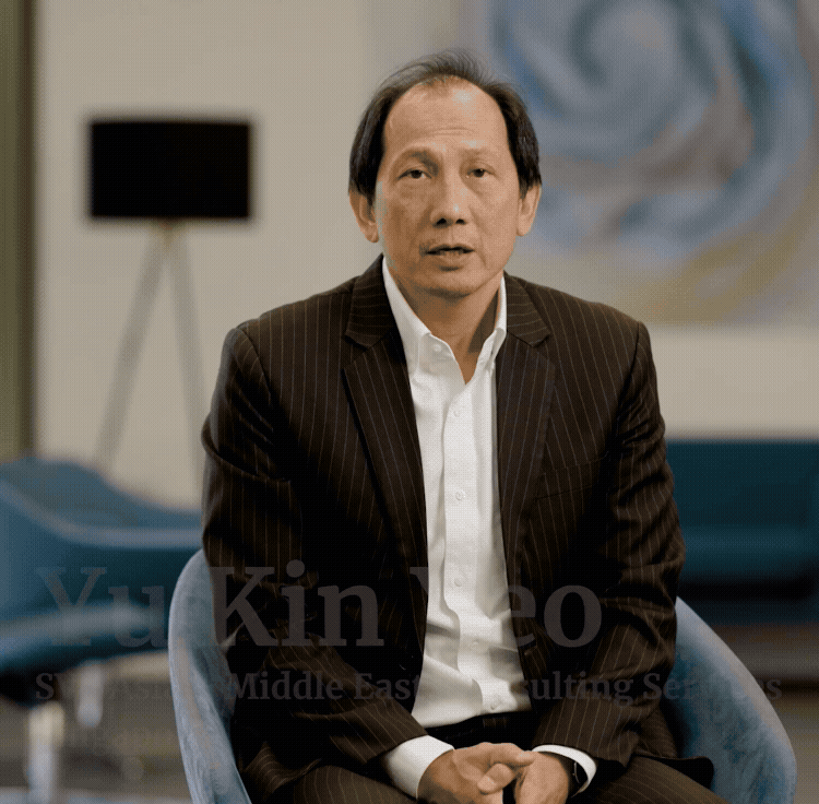 Argus team member, Yu Kin Yeo, being interviewed on camera with his name and job title displayed on screen