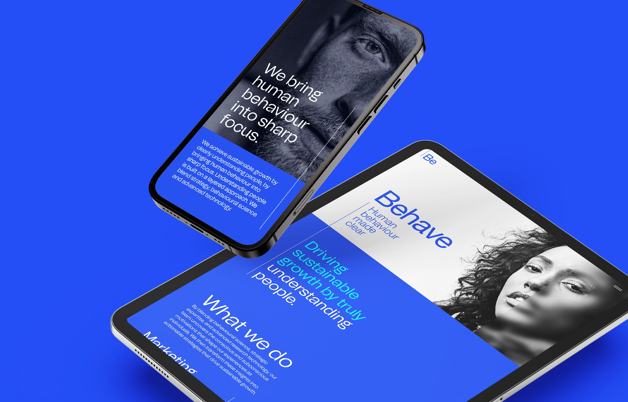 A smartphone and tablet displaying the Behave website against a vibrant blue background, showcasing mobile and desktop responsive designs.