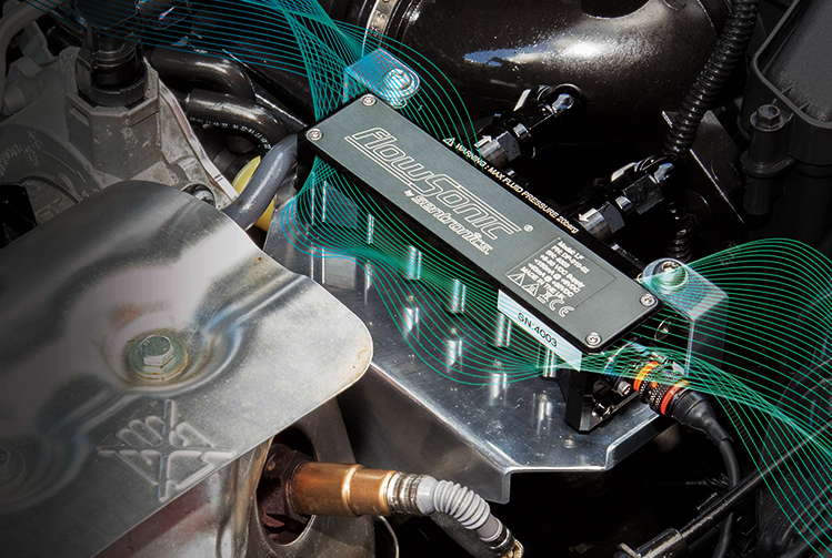 Sentronics product fitted inside engine, with branding flow lines applied